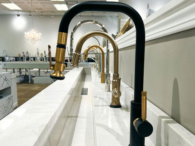Gooseneck kitchen faucet display at Facets of Charlotte North Carolina